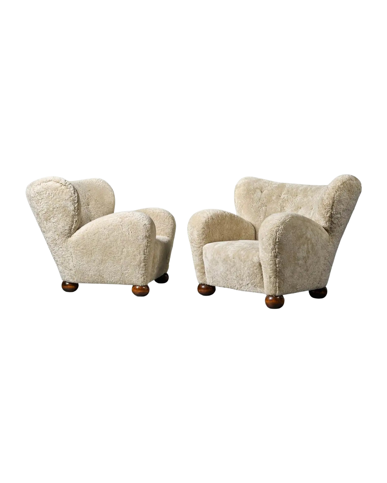 Pair of Easy Chairs in Sheepskin